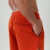 DUSKITTEN ECLIPSE LINE · Swim Shorts — campaign shot 2